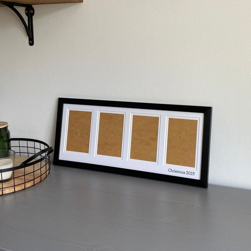 Black multi aperture picture frame for 4 photos on grey dresser and mesh tray with candles - Azana Photo FRames