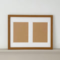 Large Brown framed, two aperture white mount on a grey shelf - Azana Photo Frames