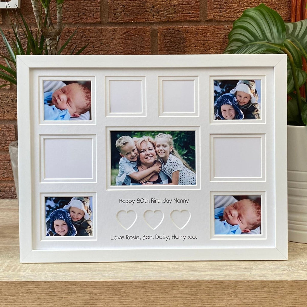 Large white frame on shelf and green plants
