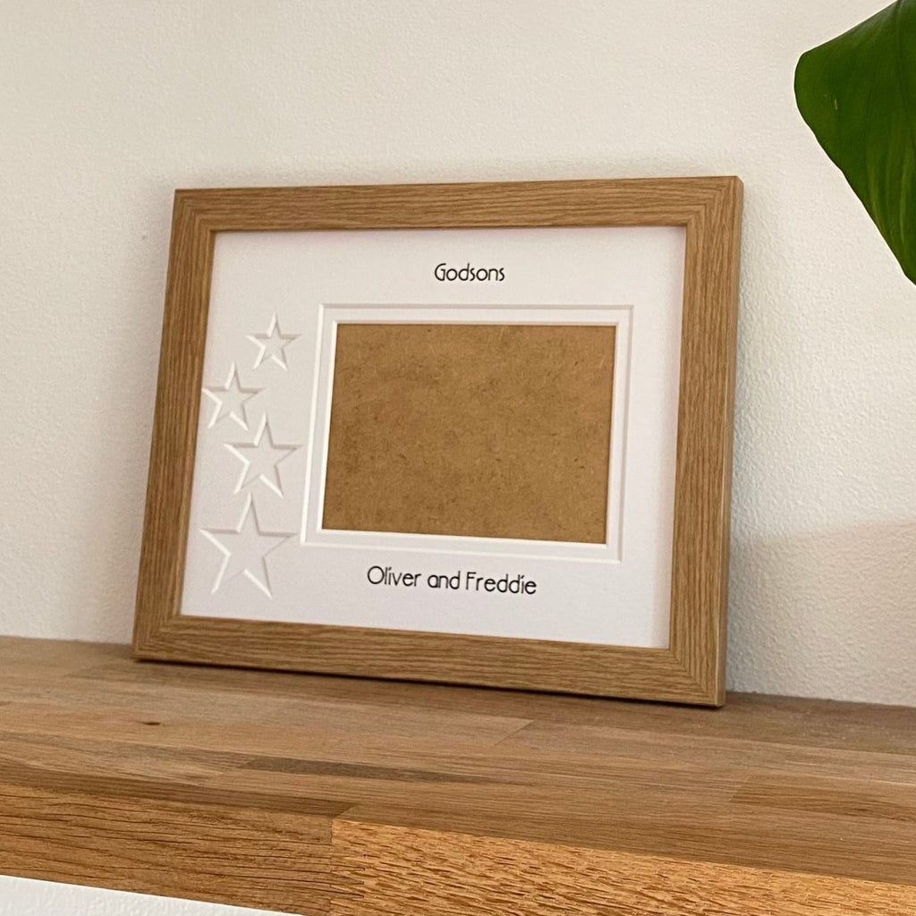 Light brown landscape star frame showing empty photo opening