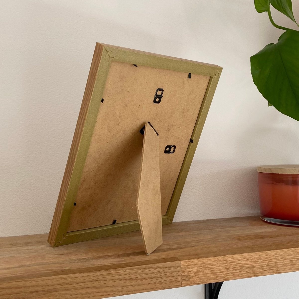 Back of a single aperture light brown  frame, lifeshot within home decor - Azana