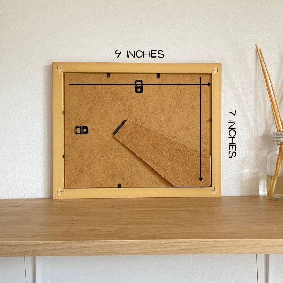 Back of a picture frame on the shelf 9 x 7 inches on the shelf