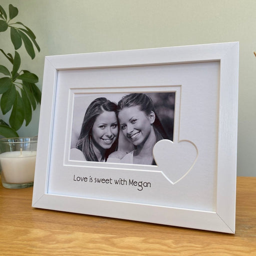 White heart picture frame next to white candle | Azana Photo Frames