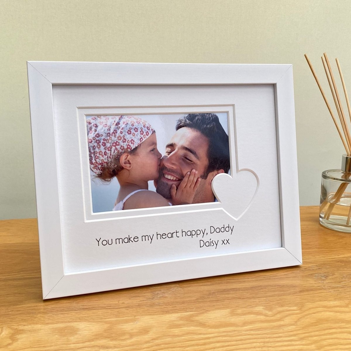 You Make My Heart Happy Picture frame next to a diffuser