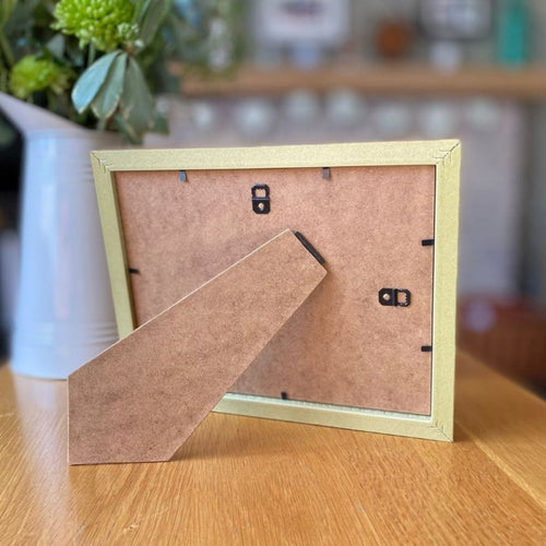 Freestanding frame on a coffee table