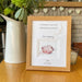 Infant Loss Personalised Picture frame on table next to a jug of fresh flowers and a candle
