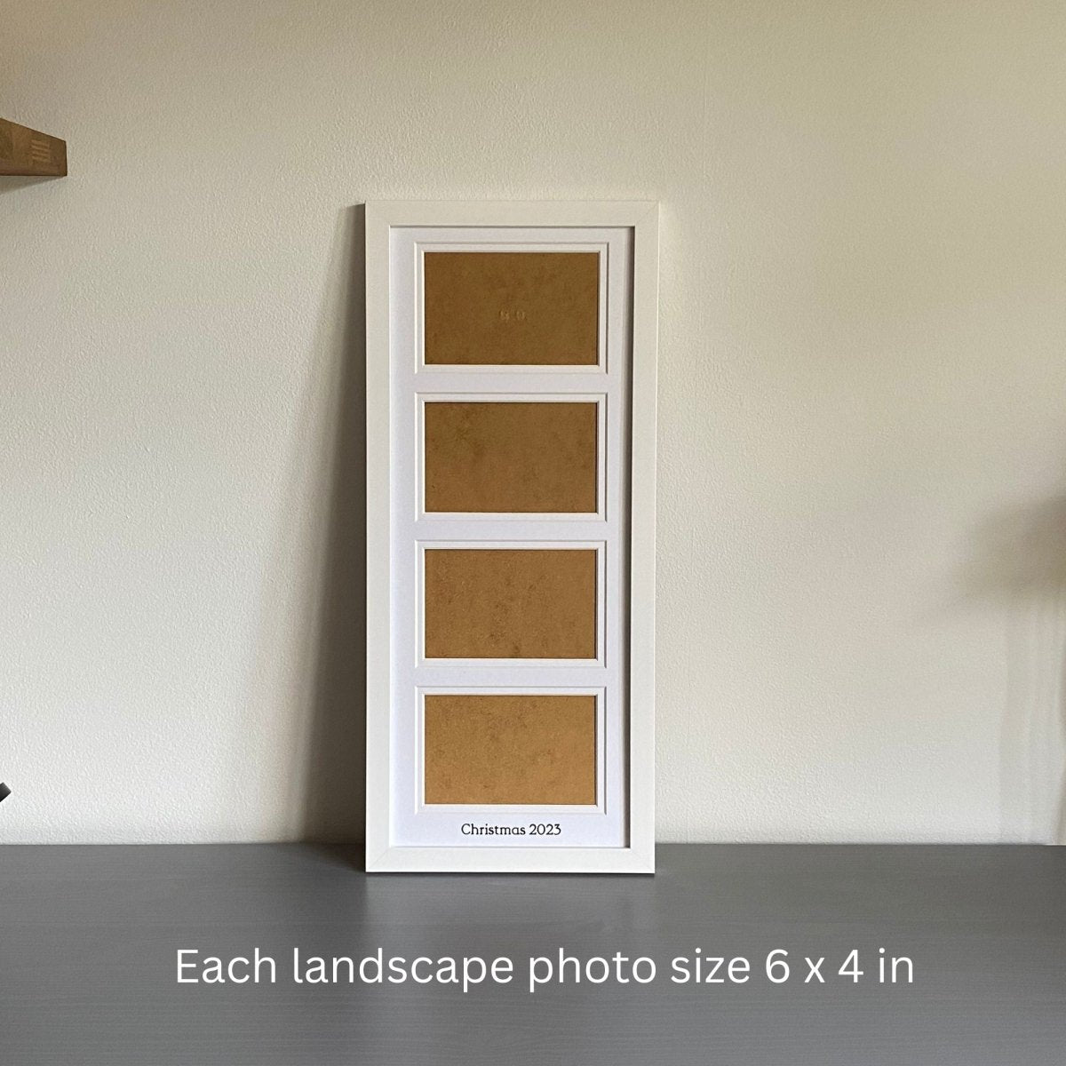 Multi Landscape Aperture Frame 4 Photos, White - holds four landscape photograph on grey tabletop with photo size measurements 6x4 - Azana Photo Frames