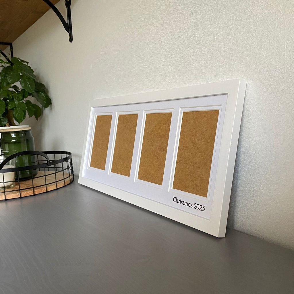 White Multipicture Frame 4 Photos, on grey dresser next to mesh tra, candles and green planty - Azana Photo Frames