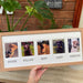 Light brown multipicture frame of family pet dogs on the tabletop with plants.