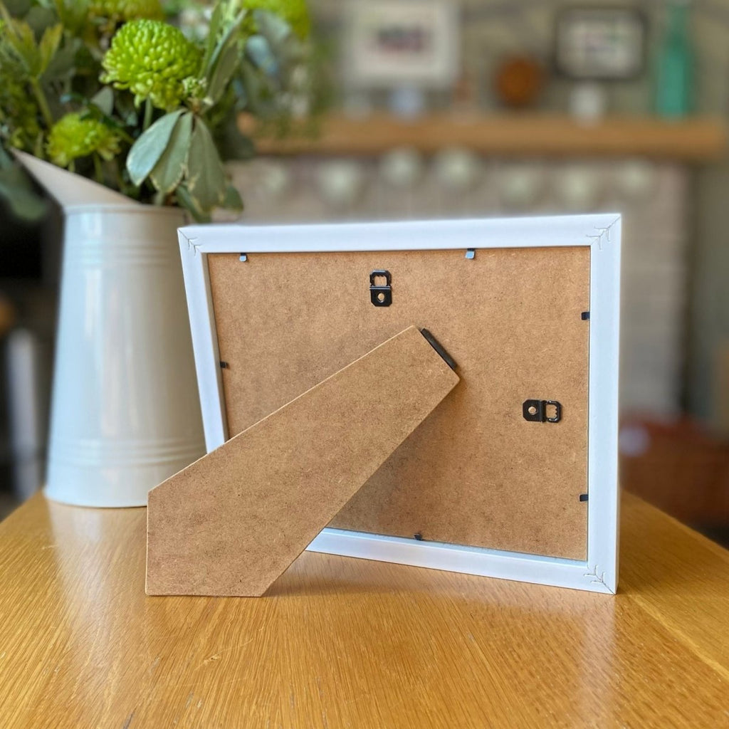 Picture frame 9 x 7 inches freestanding on the table