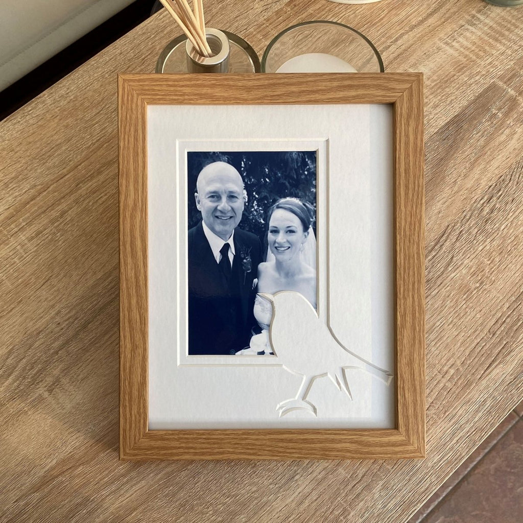 Portrait Robin Shape Picture Frame on the table