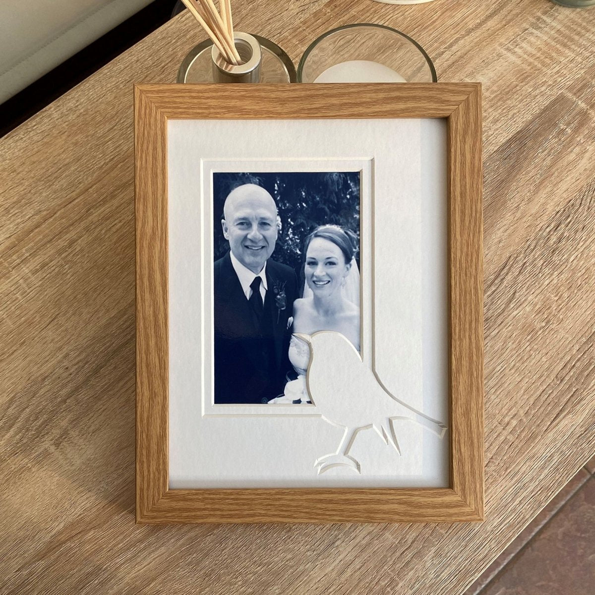 Portrait Robin Shape Picture Frame on the table